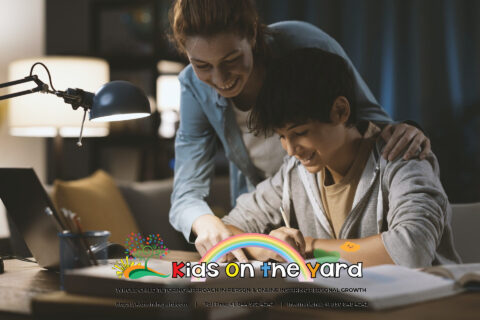 Tutor helping a student with his homework